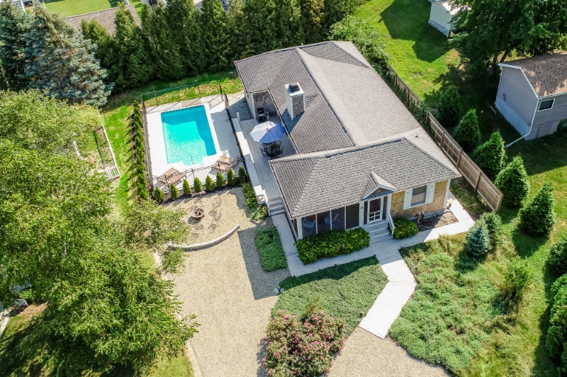 An aerial view of An aerial view of Creekside Cottage vacation rental in New Buffalo, MI. 